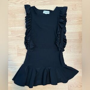 Adorable ruffle dress is excellent used condition
